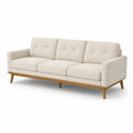 Divano beige a tre posti in tessuto con struttura in legno